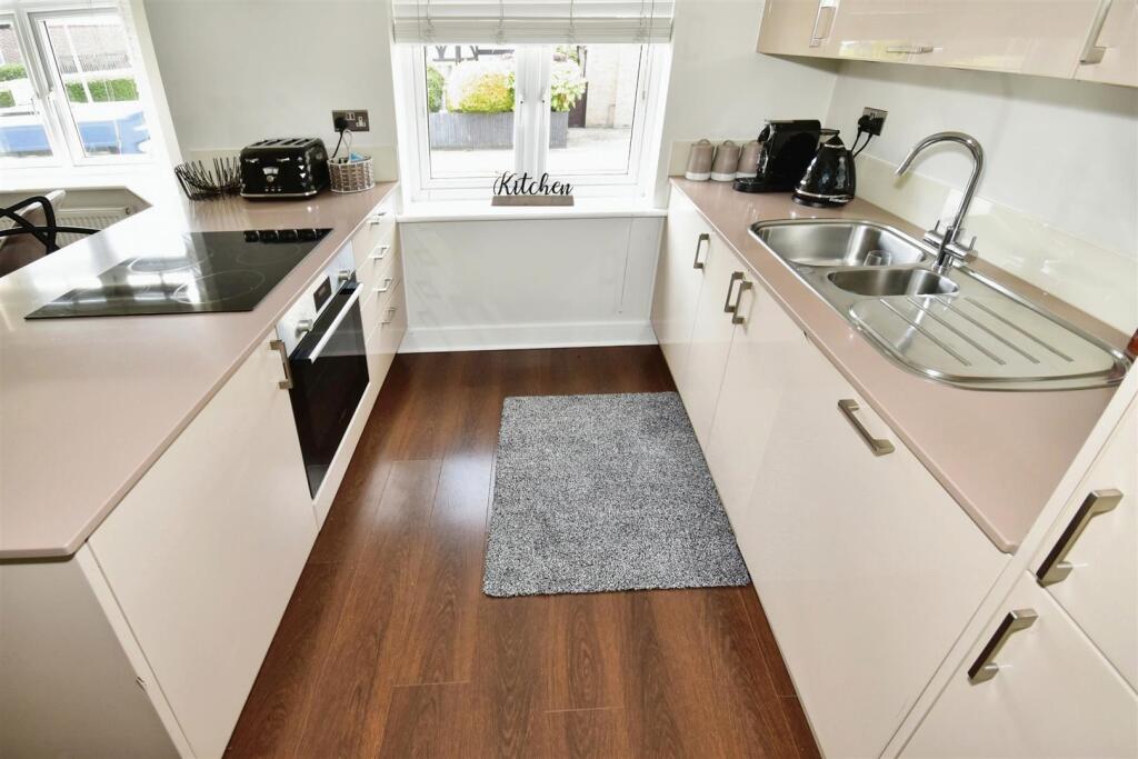 LIVING/DINING AND KITCHEN AREA