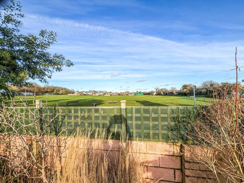 Backing onto Cricket field