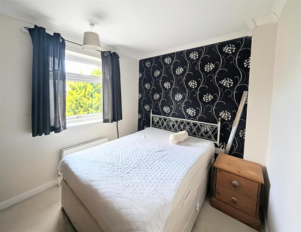 SECOND BEDROOM