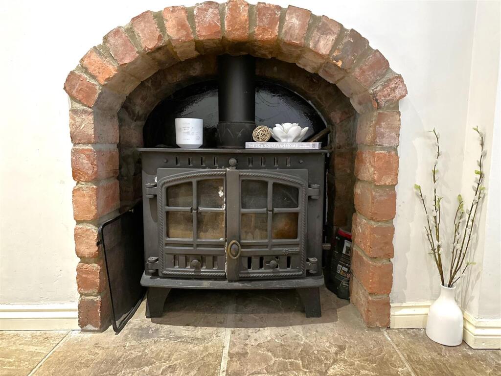Exposed Fireplace With Log Burner 654