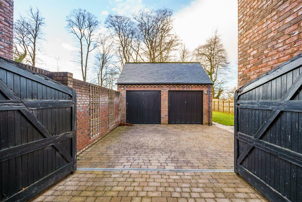Detached Double Garage / Driveway