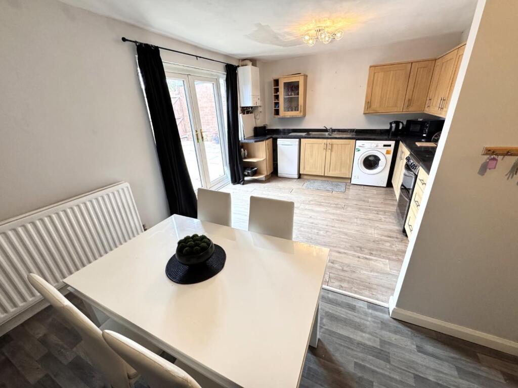 DINING AREA INTO THE KITCHEN
