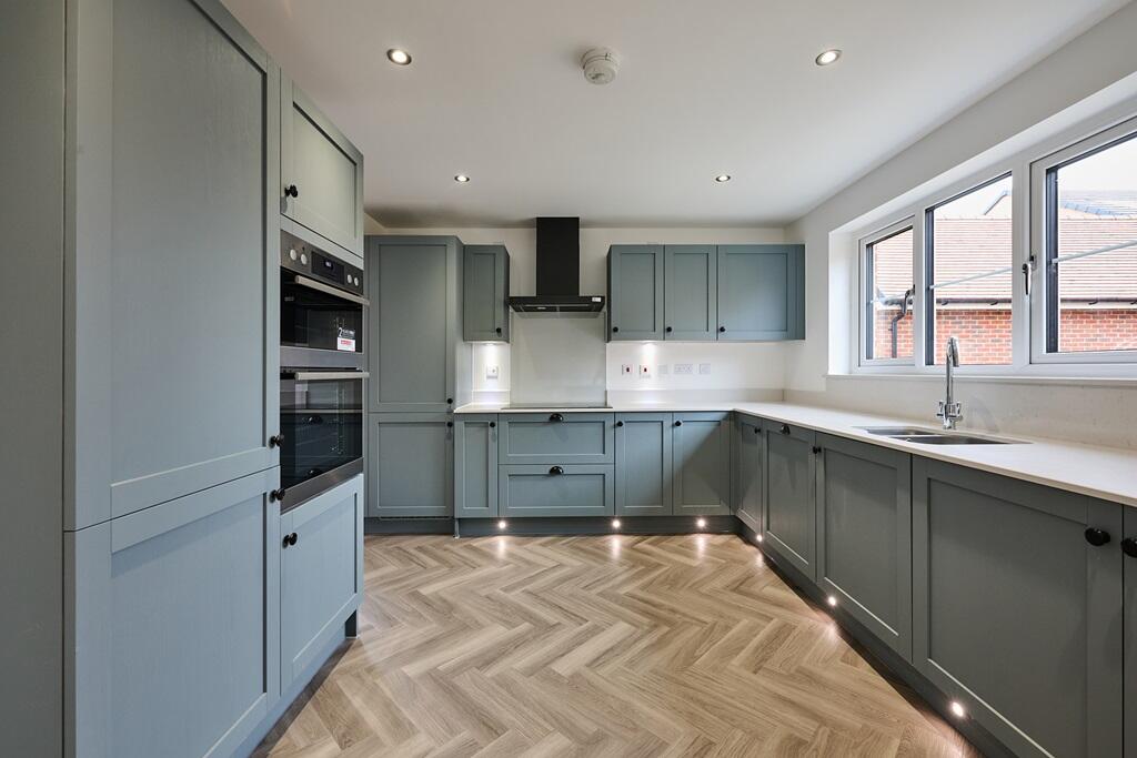 With herringbone flooring and integrated appliances