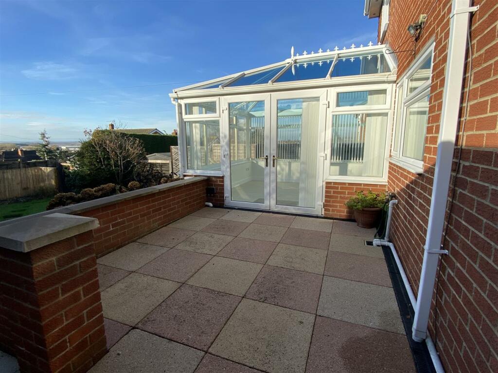 Extensive paved patio area