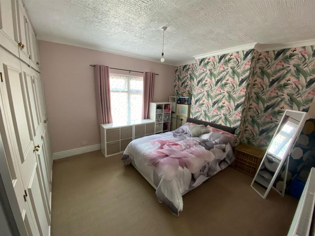 FRONT BEDROOM ONE