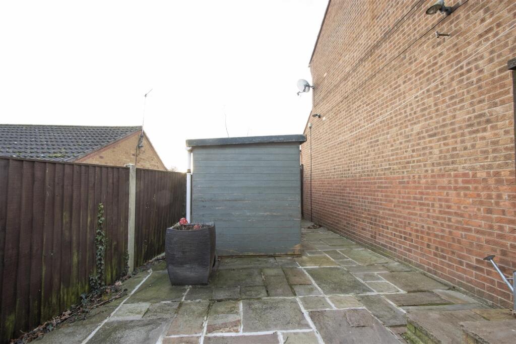 Side Patio with Shed