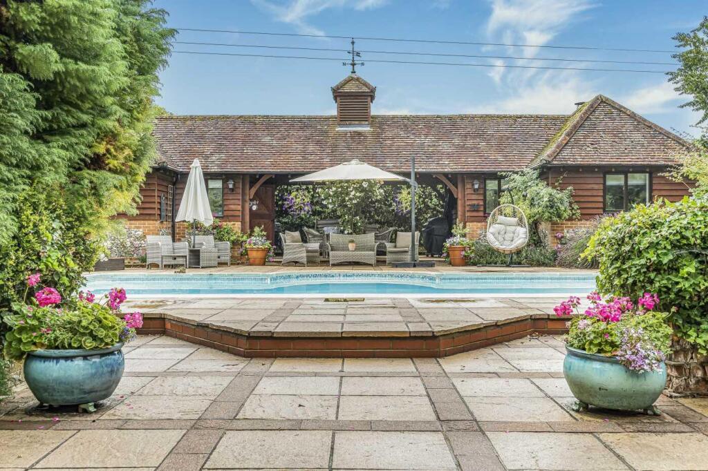 Pool with pool house