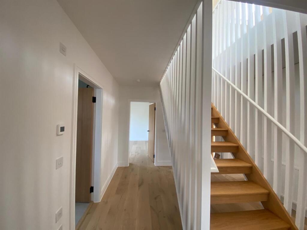 House 15 - Internal Downstairs Staircase.jpeg
