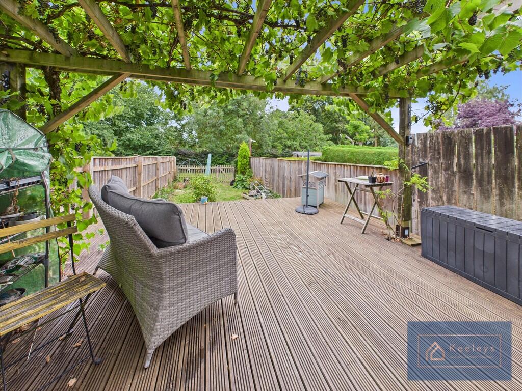 Rear decking/perg...