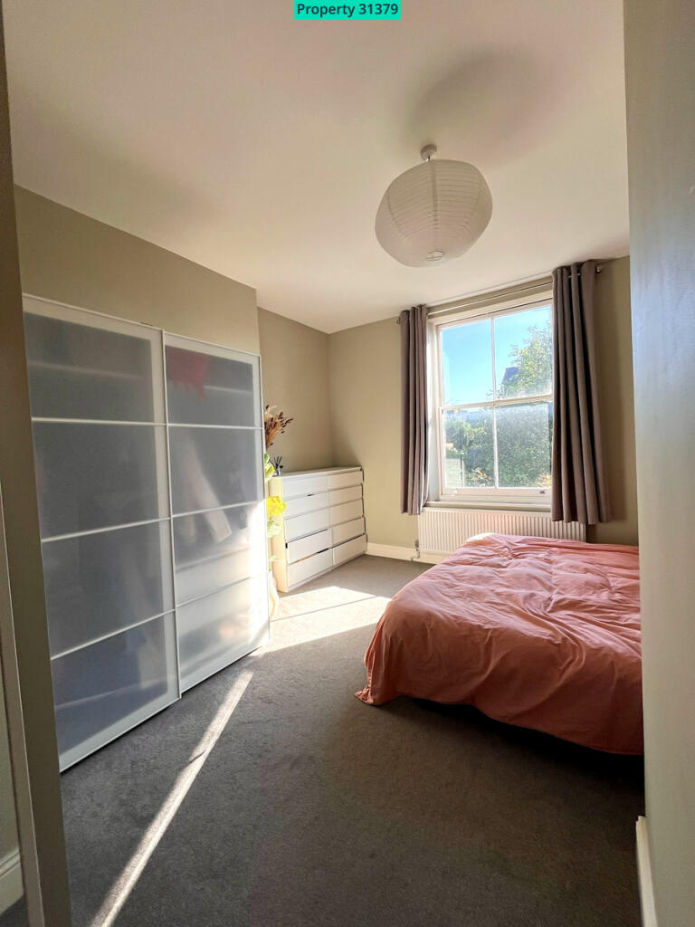 Bedroom No 1 with sun coming in