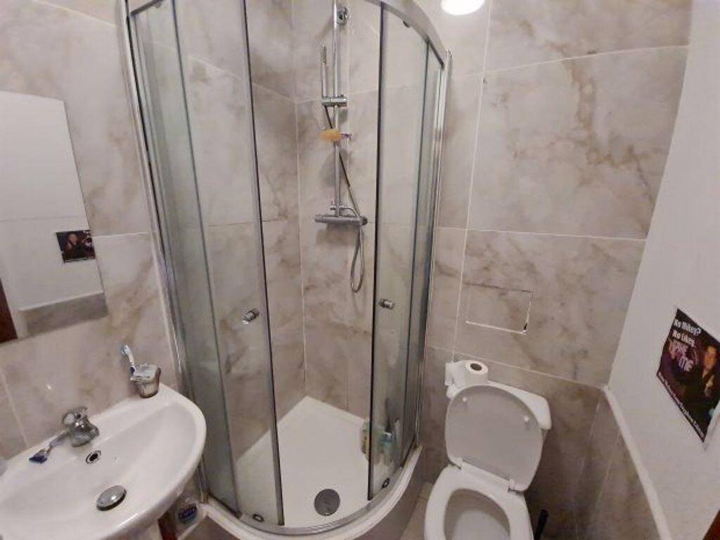 A clean and well-maintained bathroom featuring ...