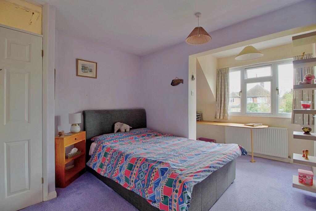 Bedroom Three has study or dressing space