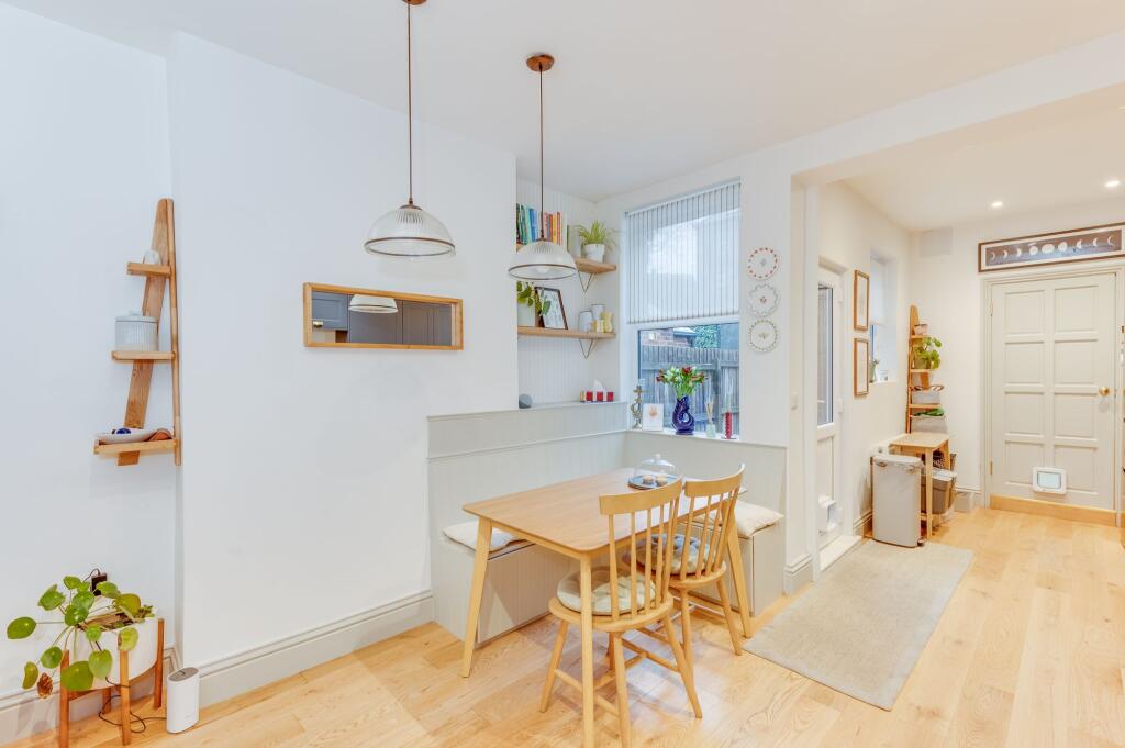 DINER OPENING TO EXTENDED FITTED KITCHEN