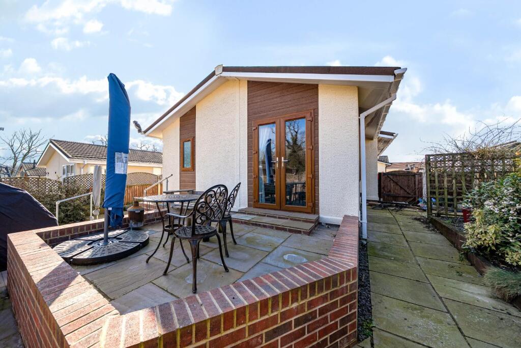 Patio with view of property.jpg