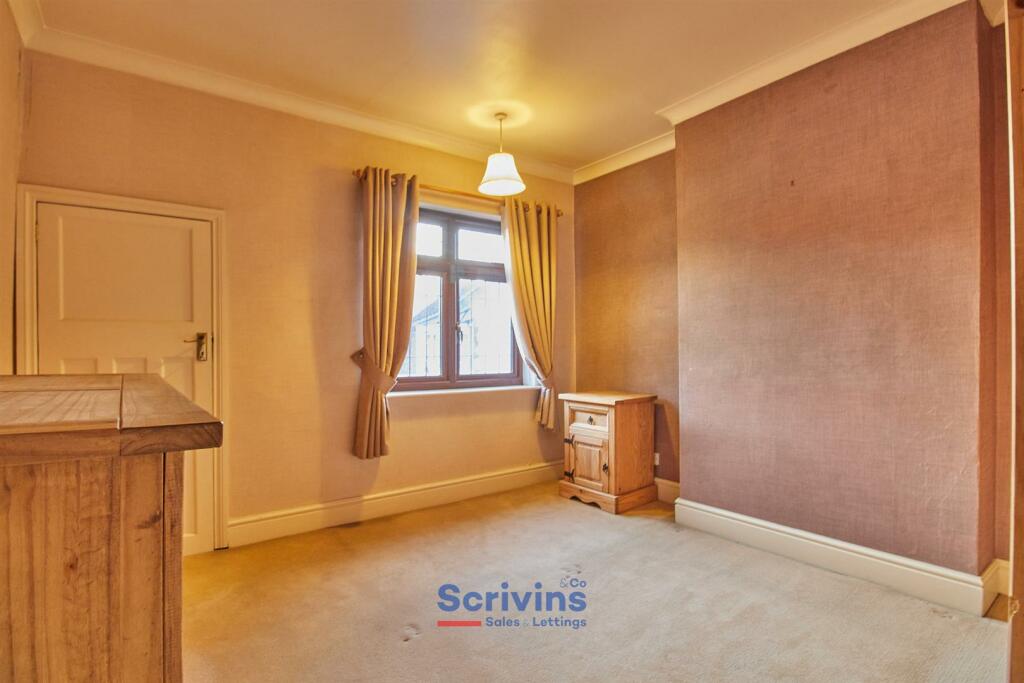 BEDROOM TWO TO REAR