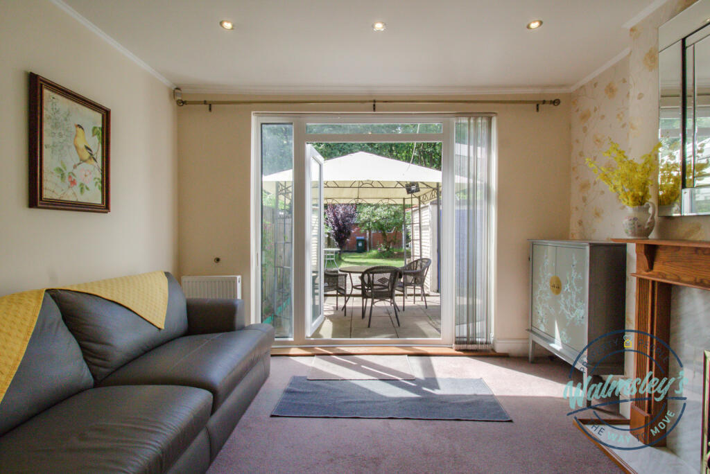 French doors to gardens from sitting room