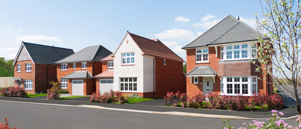 Modern residential houses with red-brick and white exteriors, large windows, and front gardens under