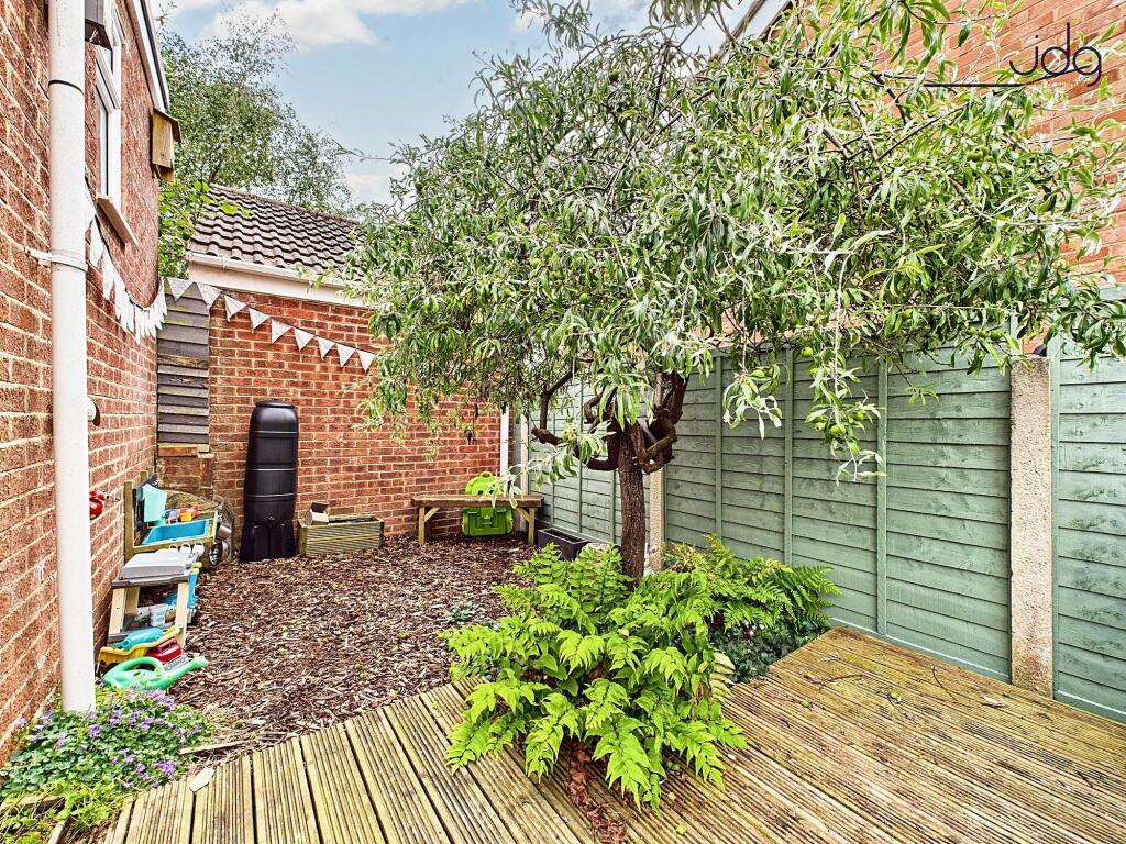 Tiered Garden with plenty of seating areas, flagged, decked and mixed lawn.