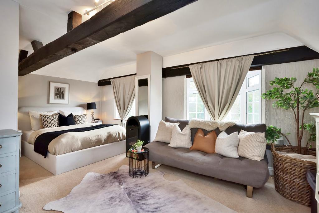 Bedroom 1 with seating and dressing area