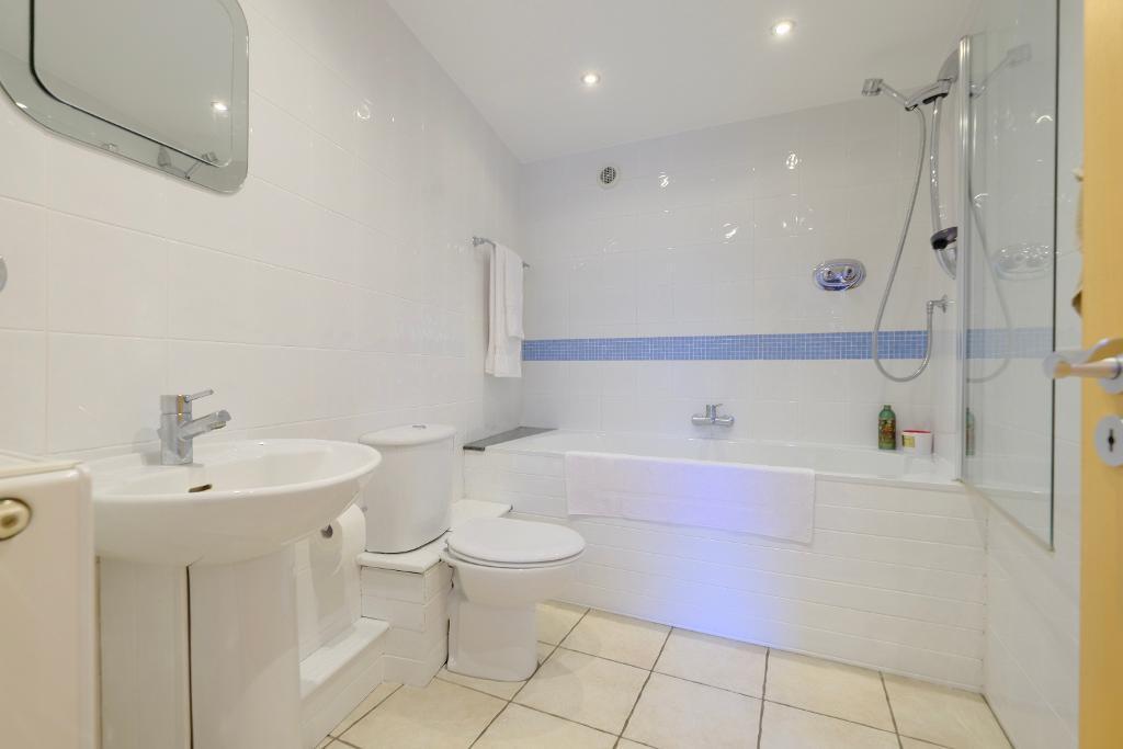 En suite bathroom to bedroom 3