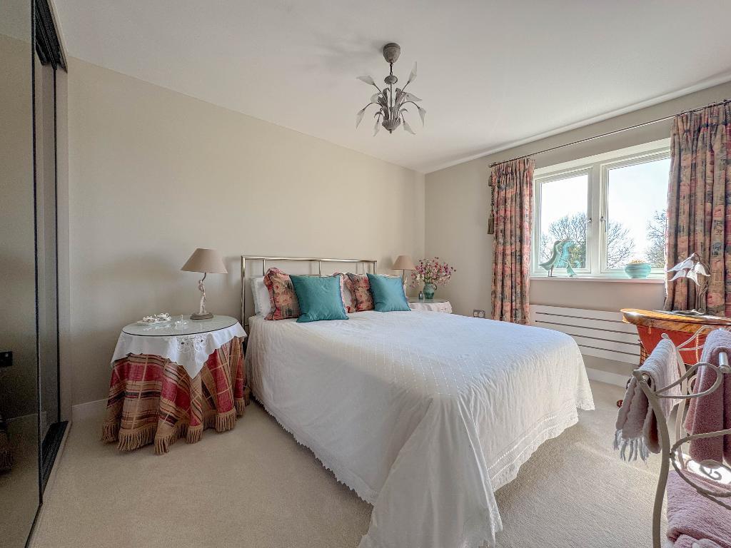 Bedroom three with built in wardrobe