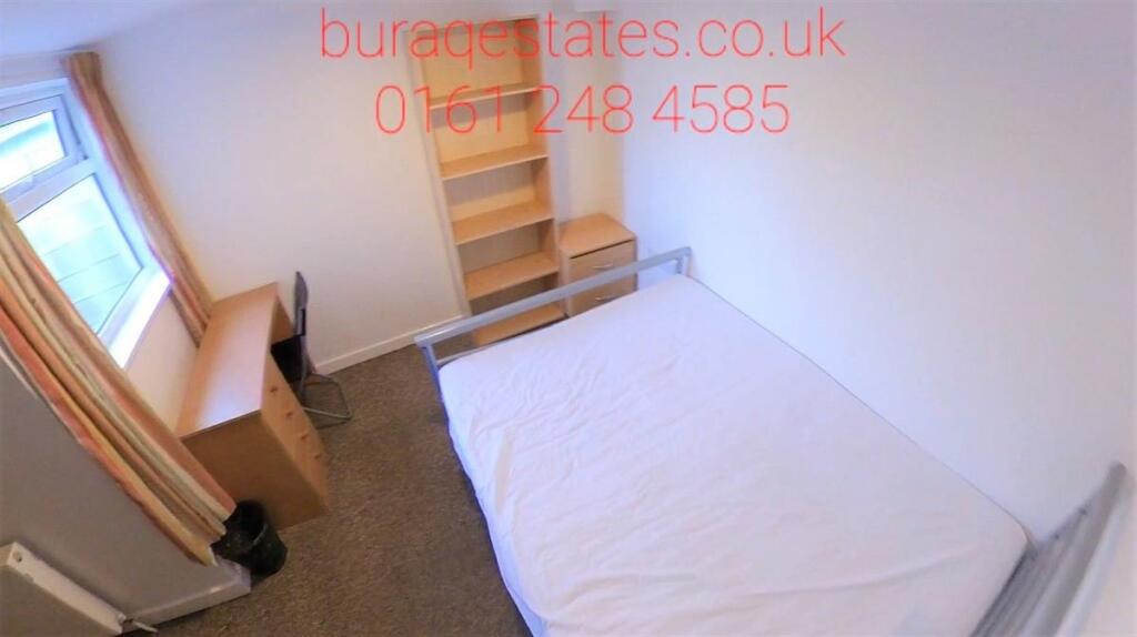 Bright and cozy single bedroom featuring a comf...