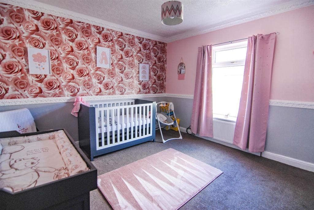 SECOND BEDROOM