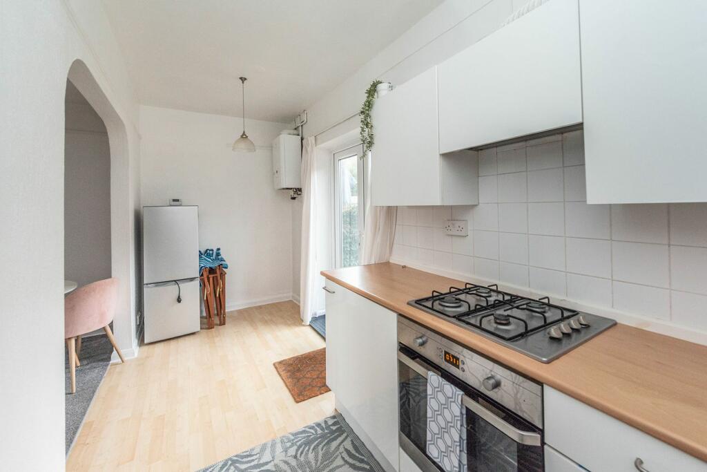 SITTING ROOM AND KITCHEN
