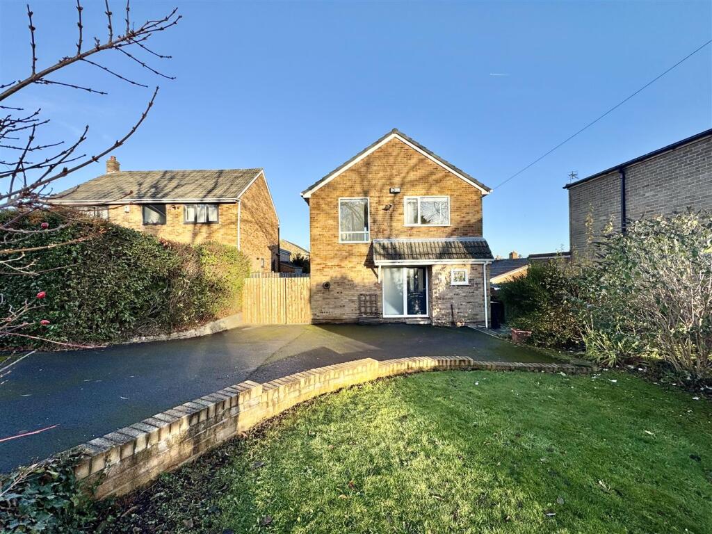 EXTERNAL FRONT AND DRIVEWAY