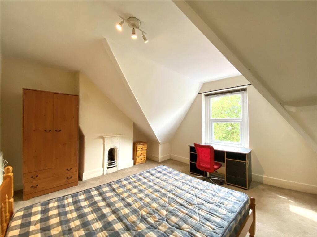 Bright and inviting double bedroom featuring am...
