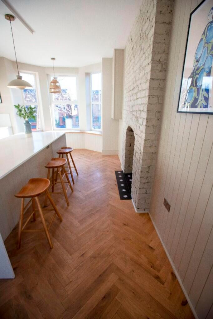 A bright and inviting kitchenette with modern d...