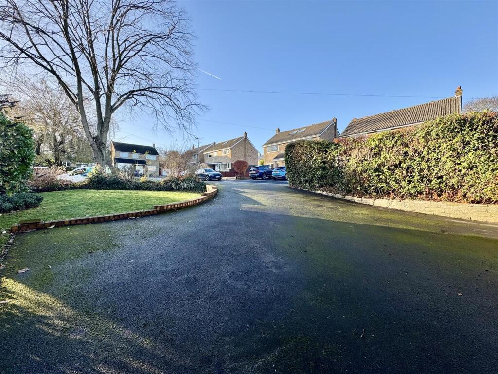 EXTERNAL FRONT AND DRIVEWAY