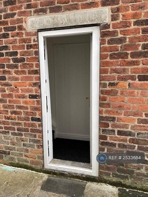 Flat Entrance From Alley Way