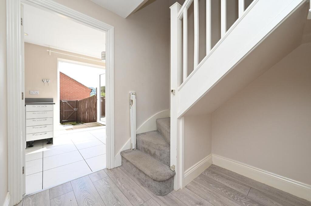 Sitting Room - stairs, kitchen and garden.jpg