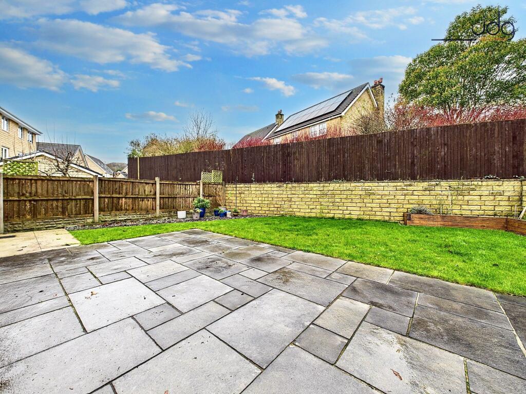 Spacious West-Facing Garden with Lawn and Seating Areas