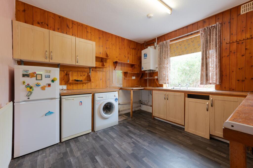 SITTING ROOM AND DINING KITCHEN