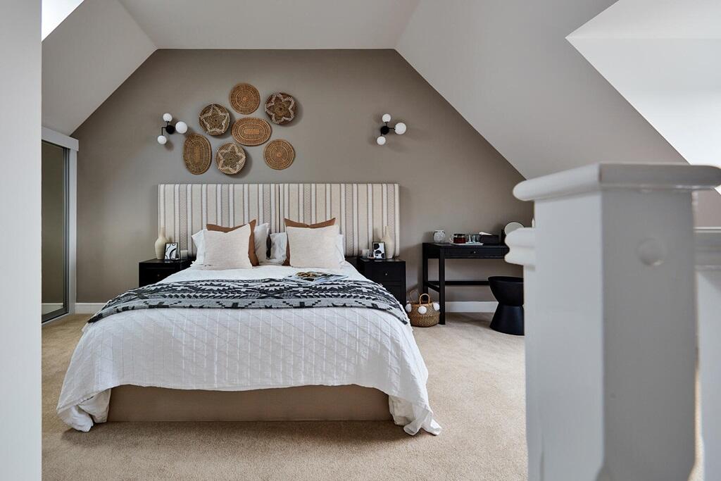 Bedroom 1 occupies the whole top floor, creating a private and peaceful area