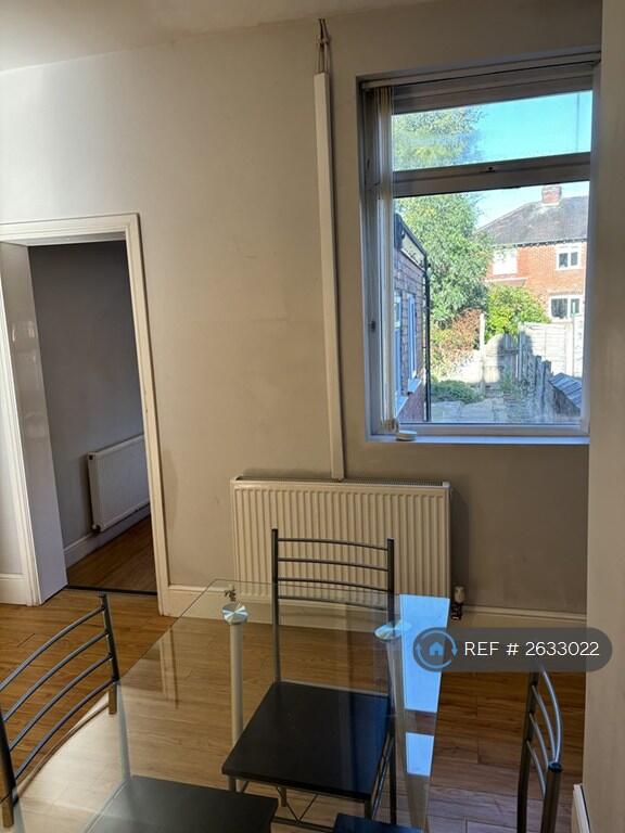 Dining Area Leading To Kitchen