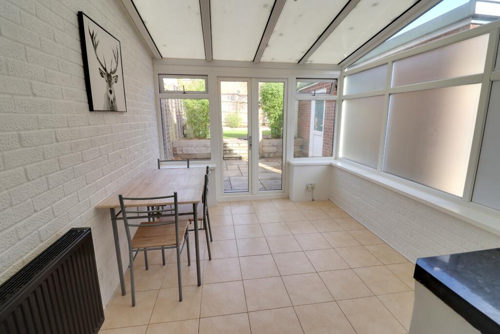 CONSERVATORY/DINING ROOM