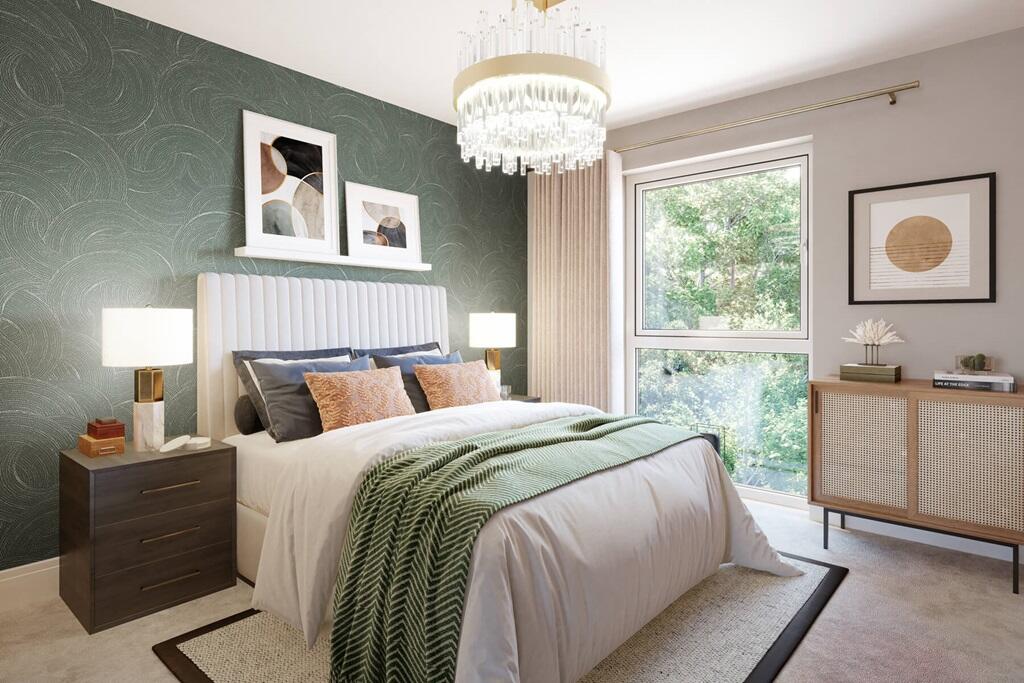 The main bedroom offers plenty of space to unwind and relax