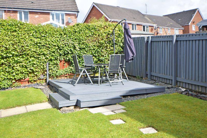 DECKED PATIO AREA
