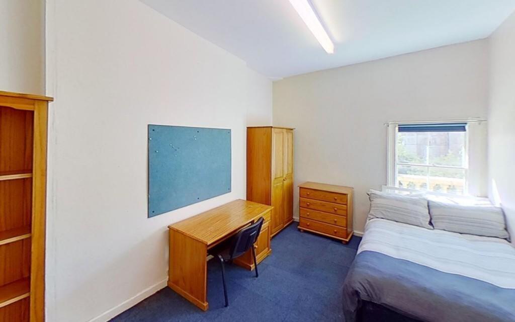 Bright and inviting double bedroom featuring a ...
