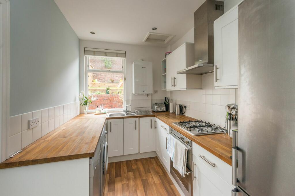 SITTING ROOM DINING ROOM AND KITCHEN