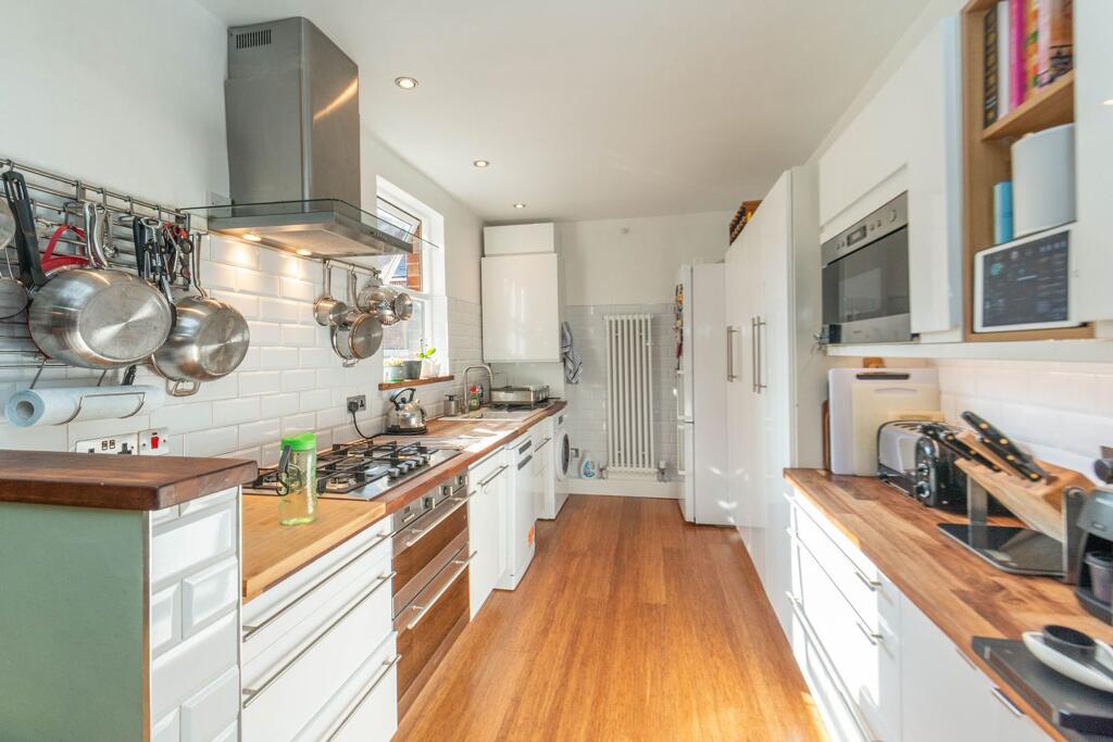SITTING ROOM AND OPEN PLAN DINING KITCHEN