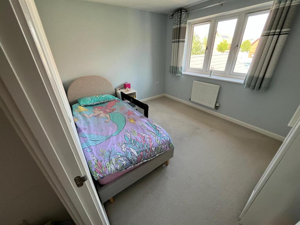 SECOND BEDROOM