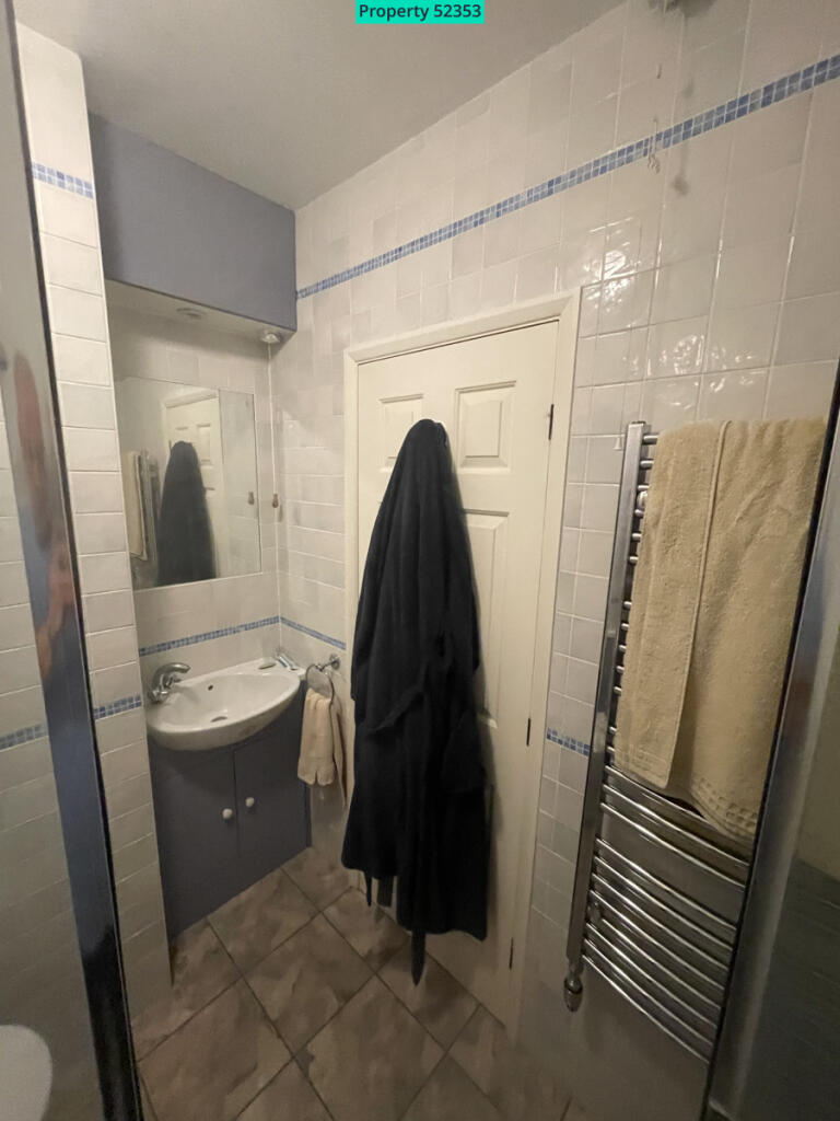 Stood in the ensuite shower