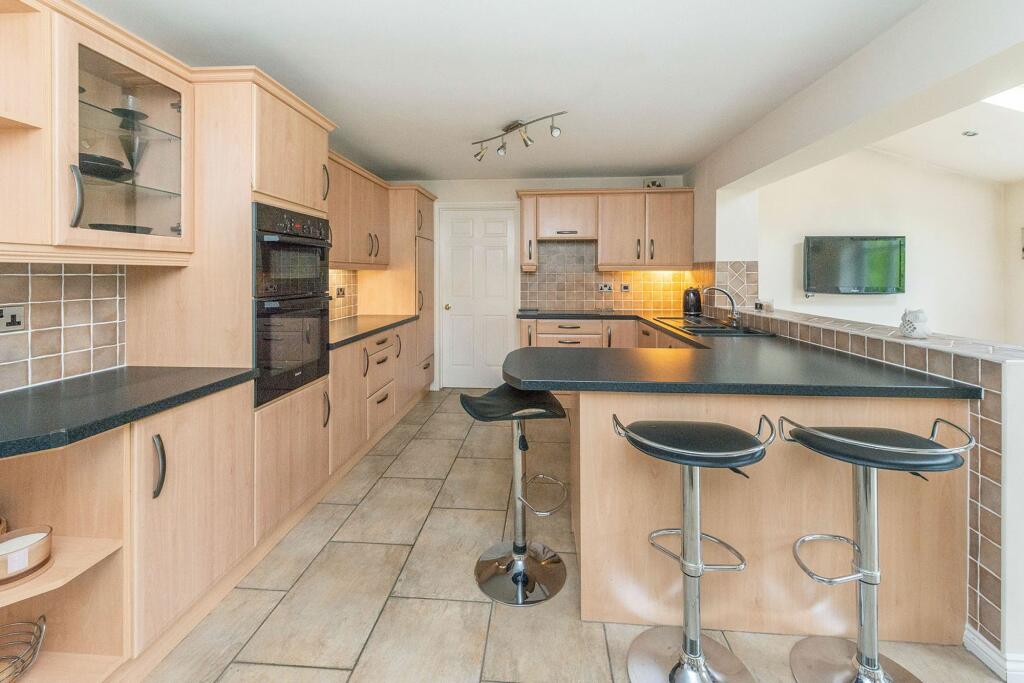 SITTING ROOM AND EXTENDED DINING KITCHEN