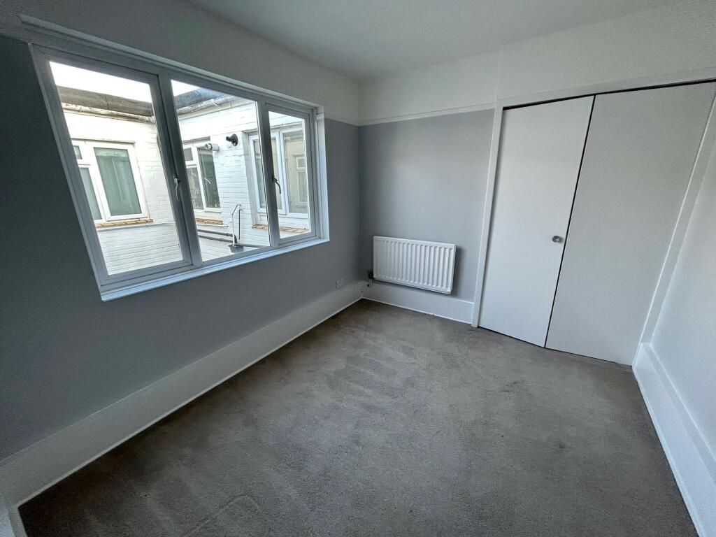SECOND BEDROOM
