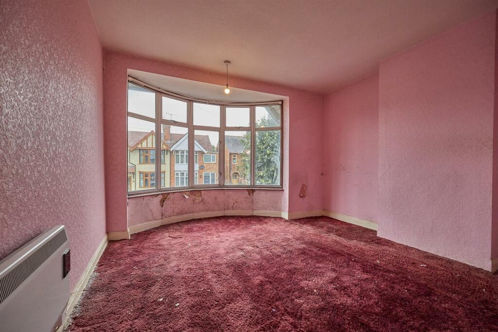 FRONT BEDROOM ONE