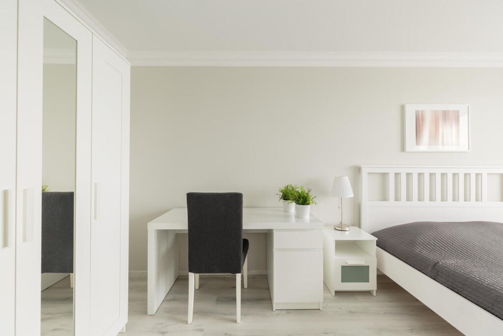 photo-of-light-cosy-bedroom-with-study-area-2025-1